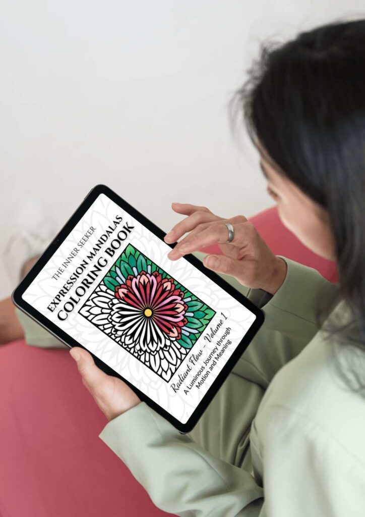 Woman holding a tablet with the Expression Mandalas Coloring Book by The Inner Seeker displayed on screen