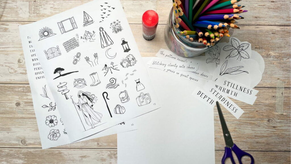 Art journal supplies for creating an archetype page, including printed kit pages, scissors, glue, and colored pencils